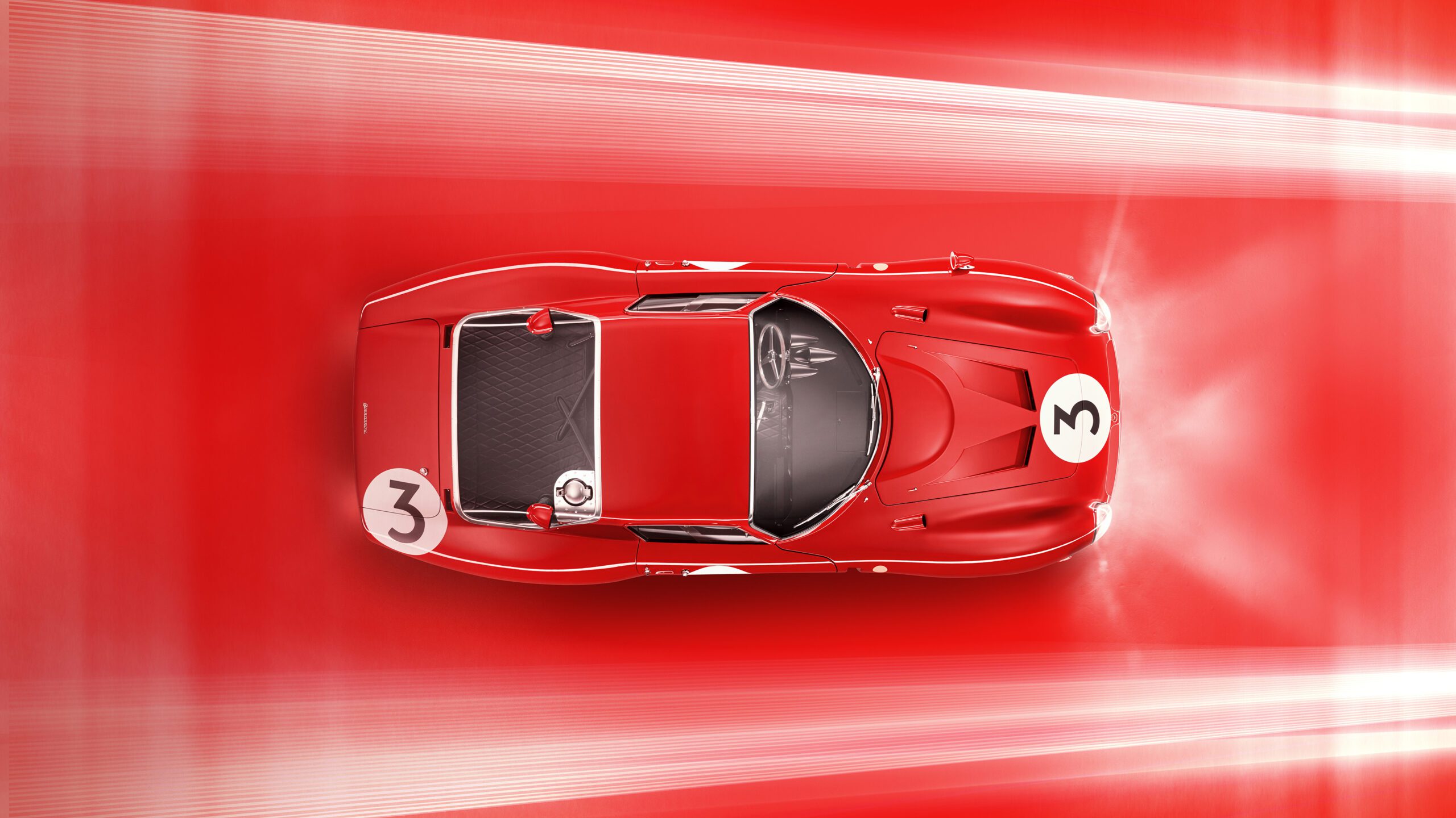 Top view of a retouched red vintage race car, reminiscent of the Bizzarrini 5300 GT Corsa Rossa, driving on a red background with white speed lines suggesting motion. The car features a white circle on the front hood and side, each with the number 3 inside.