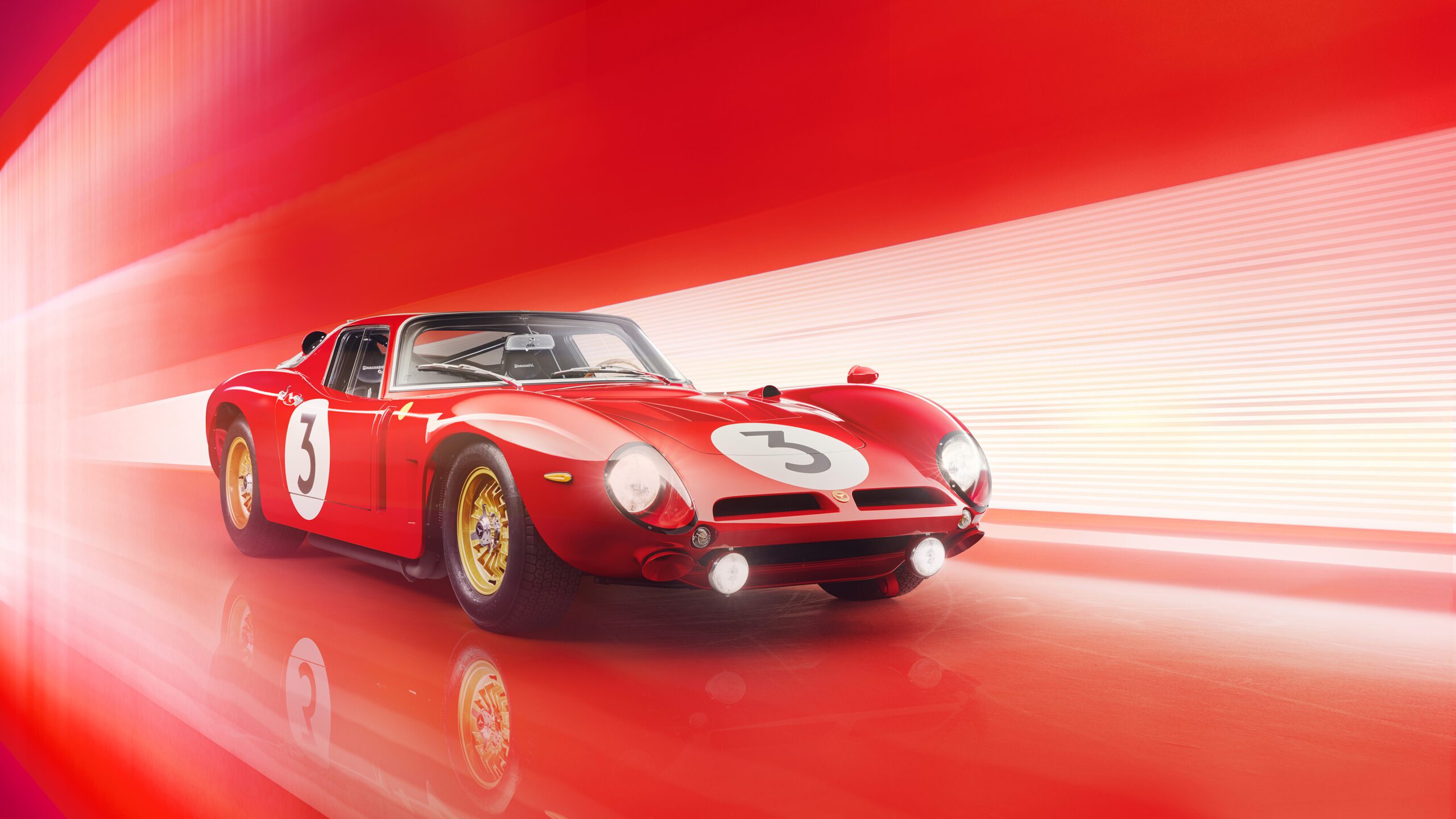 A red vintage race car, reminiscent of the Bizzarrini 5300 GT Corsa, with the number "3" on the doors and hood, surrounded by dynamic red and white light trails that create a sense of motion and speed. The car's sleek curves, large round headlights, and gold wheels have been meticulously retouched against a vibrant background.