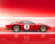 Side view of a sleek, red vintage Bizzarrini 5300 GT Corsa with the number 3 on its door and hood, set against a dynamic red and white blurred background. The car has gold rims and an aerodynamic design, creating a sense of speed and motion in this retouched image.
