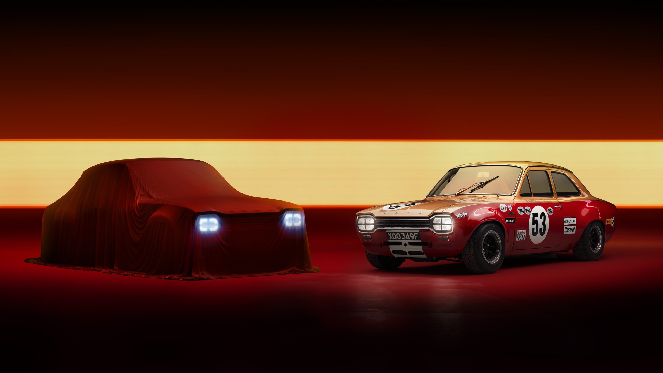 A classic red racing car with the number 53 is parked next to a mysterious silhouette covered in a red cloth. The cloth is draped over the vehicle, revealing only its illuminated headlights. In the background, a gradient of dark to light orange sets the scene, hinting at an expertly retouched Ford Escort MK1 DRVN.