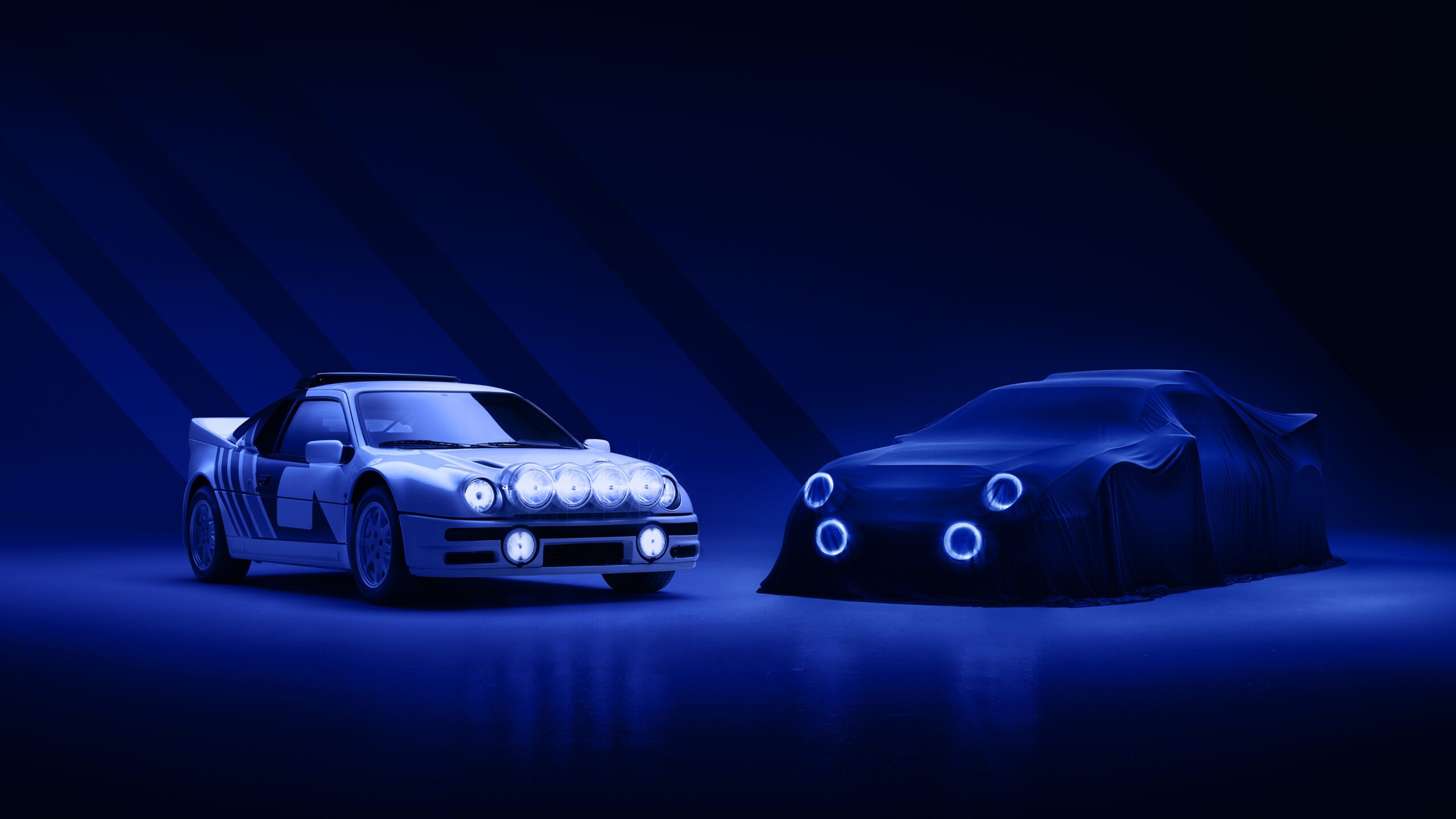 A sports car with multiple headlights is parked in a dimly lit blue setting beside another car covered with a cloth, revealing only its circular headlights and front grille outlines. The scene is dramatic and futuristic, with shadows highlighting the vehicles, almost like they were curated by a skilled car retoucher.