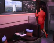 A flight attendant in a red uniform stands near a curtain in the modern Virgin Atlantic A350 Airbus cabin, looking at a screen showing an aerial view. The cabin features plush seating, pillows, a small table with snacks and drinks, and ambient lighting with star-like designs, all resembling professional retouching.