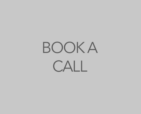 Grey background with the words "BOOK A CALL" written in large, bold, grey letters in the centre.