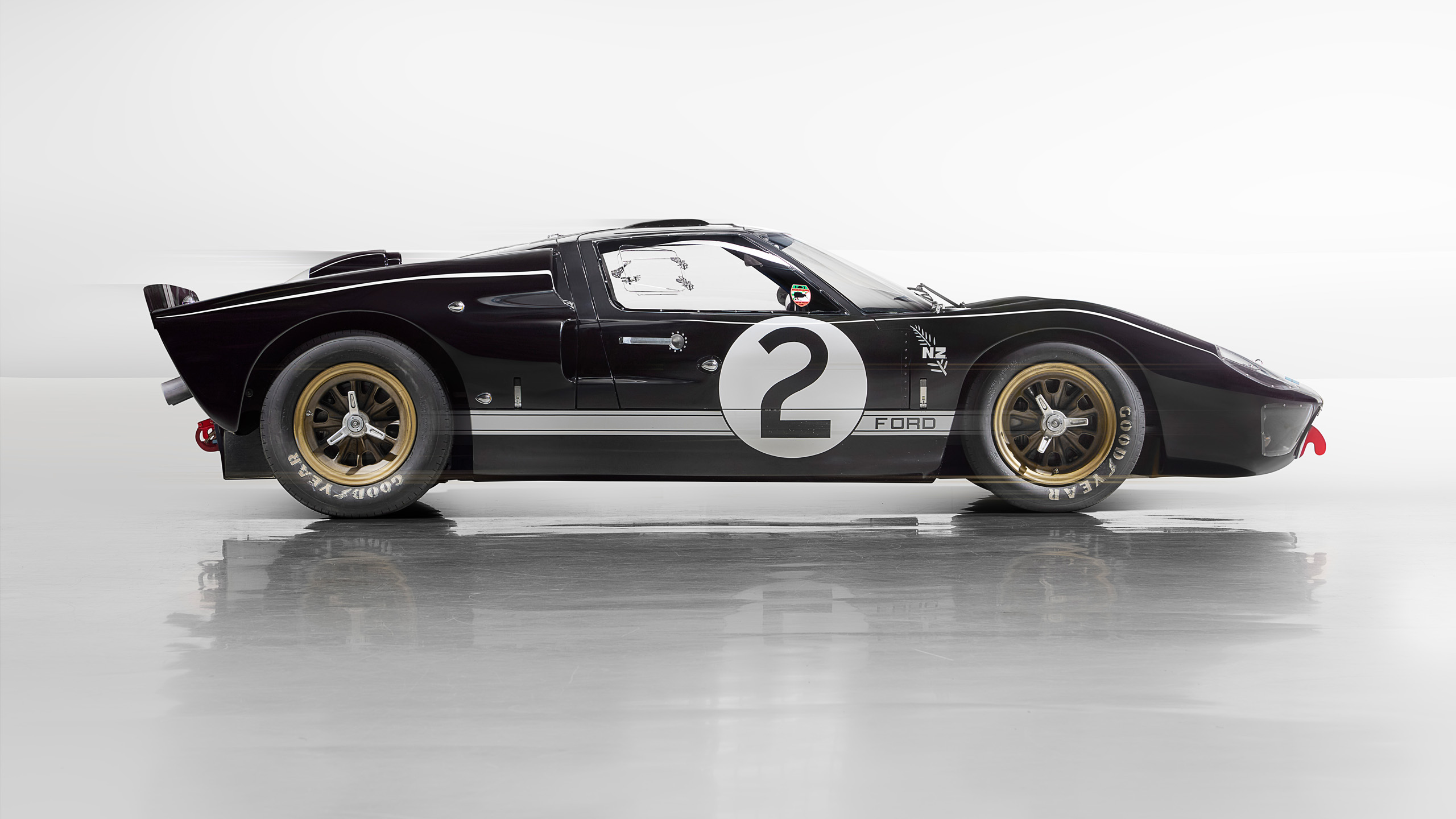 ford-gt40-1966-le-mans-black-car-2-side-profile_16x9 Side profile of the black number 2 Ford GT40, one of three cars that finished 1-2-3 at Le Mans in 1966.