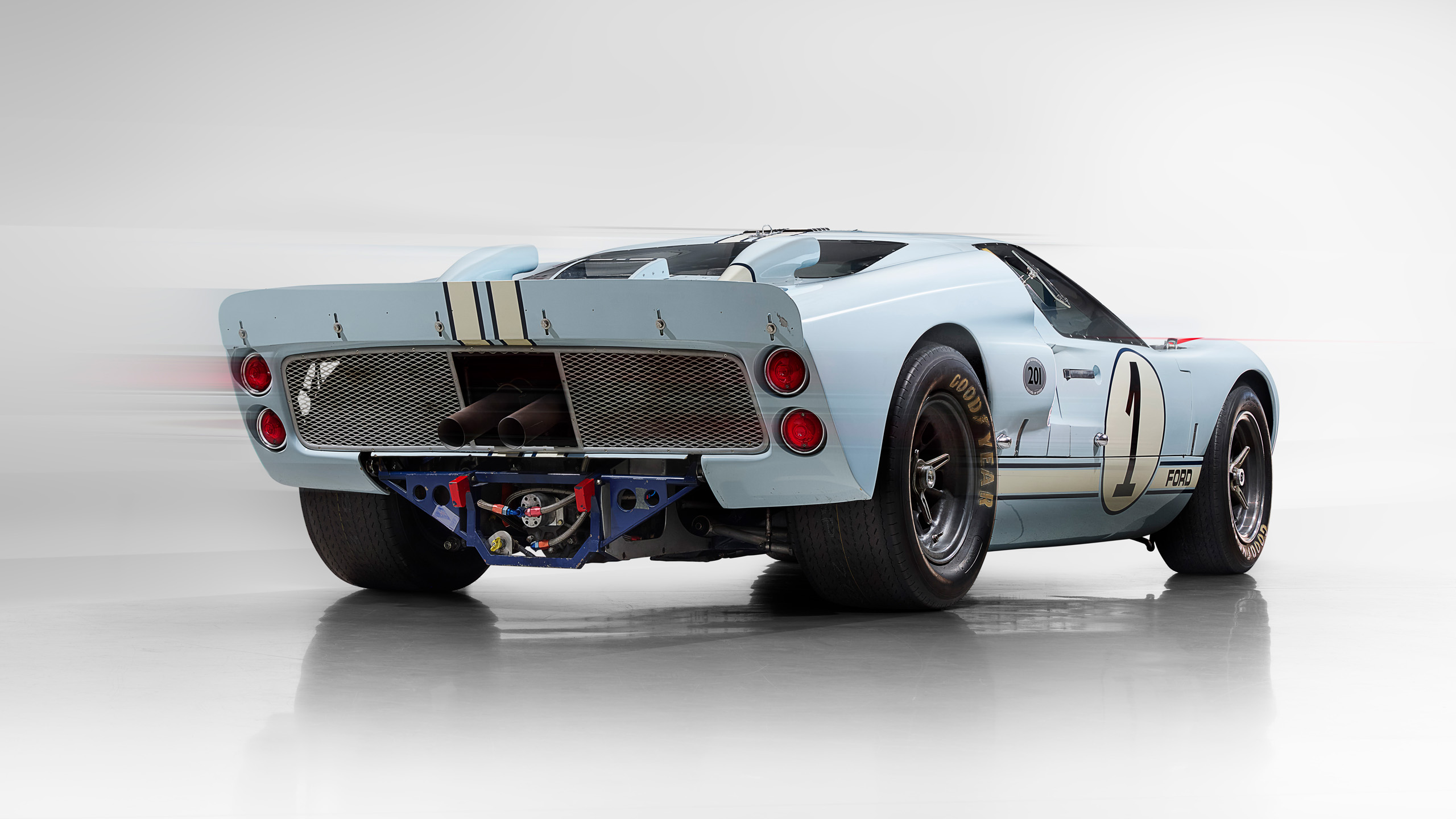 ford-gt40-1966-le-mans-blue-car-1-rear-three-quarter_16x9 Rear three-quarter view of the number 1 Ford GT40 from the 1966 Le Mans 1-2-3 finish.