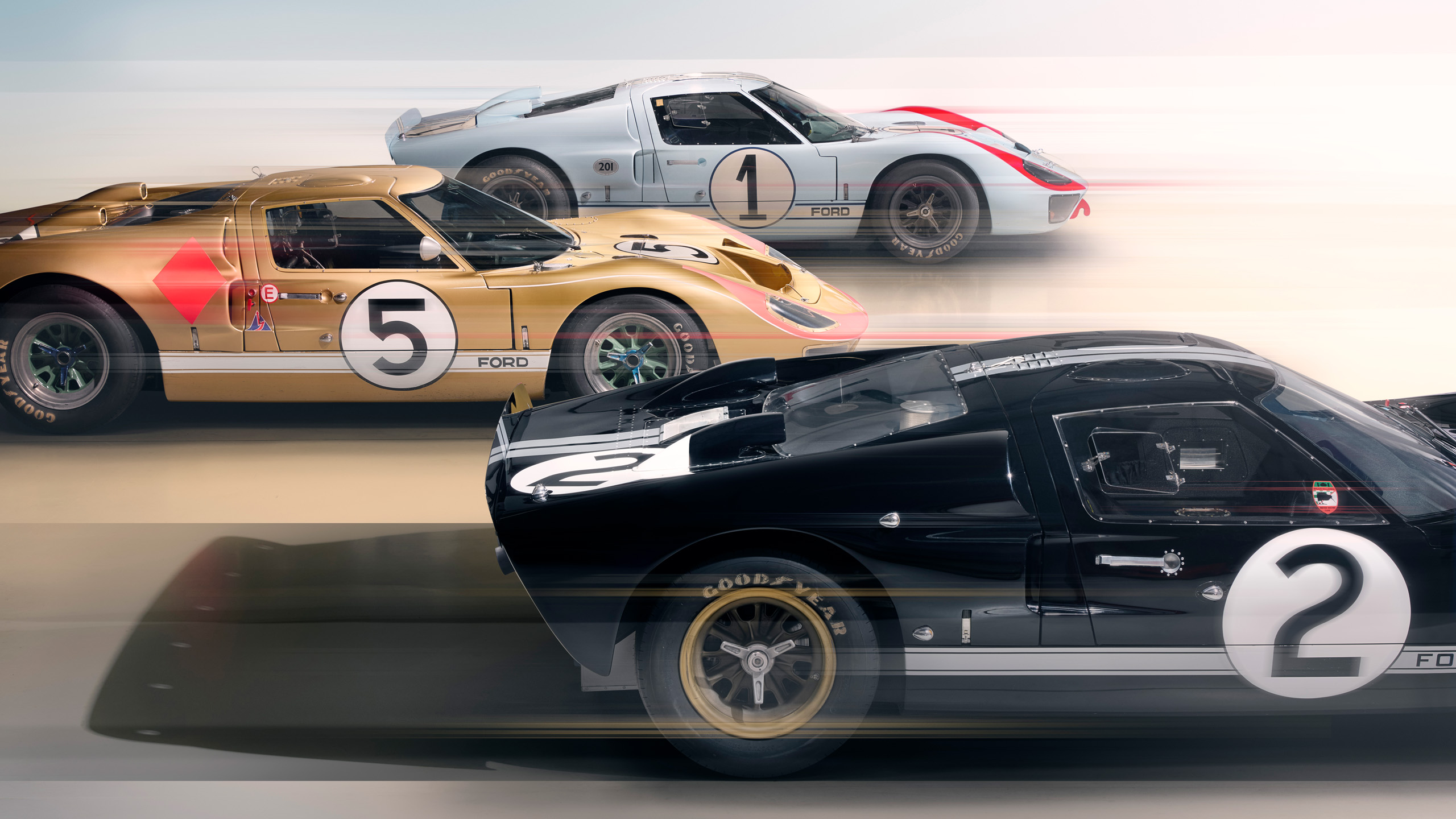 ford-gt40-1966-le-mans-three-cars-cover_16x9 Composite cover image of all three Ford GT40s that finished 1-2-3 at Le Mans in 1966, shot for Magneto.
