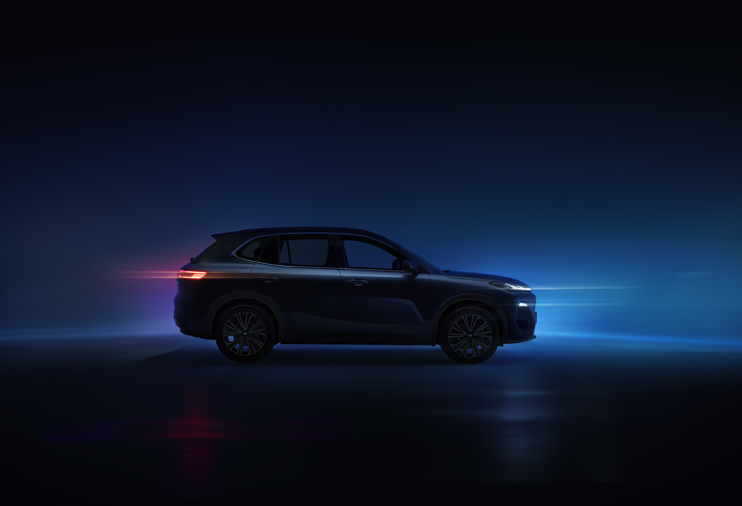geely-starray-emi-teaser-side-profile Pre-launch teaser image of the Geely Starray EM-i in silhouette, side profile, with light trails behind.