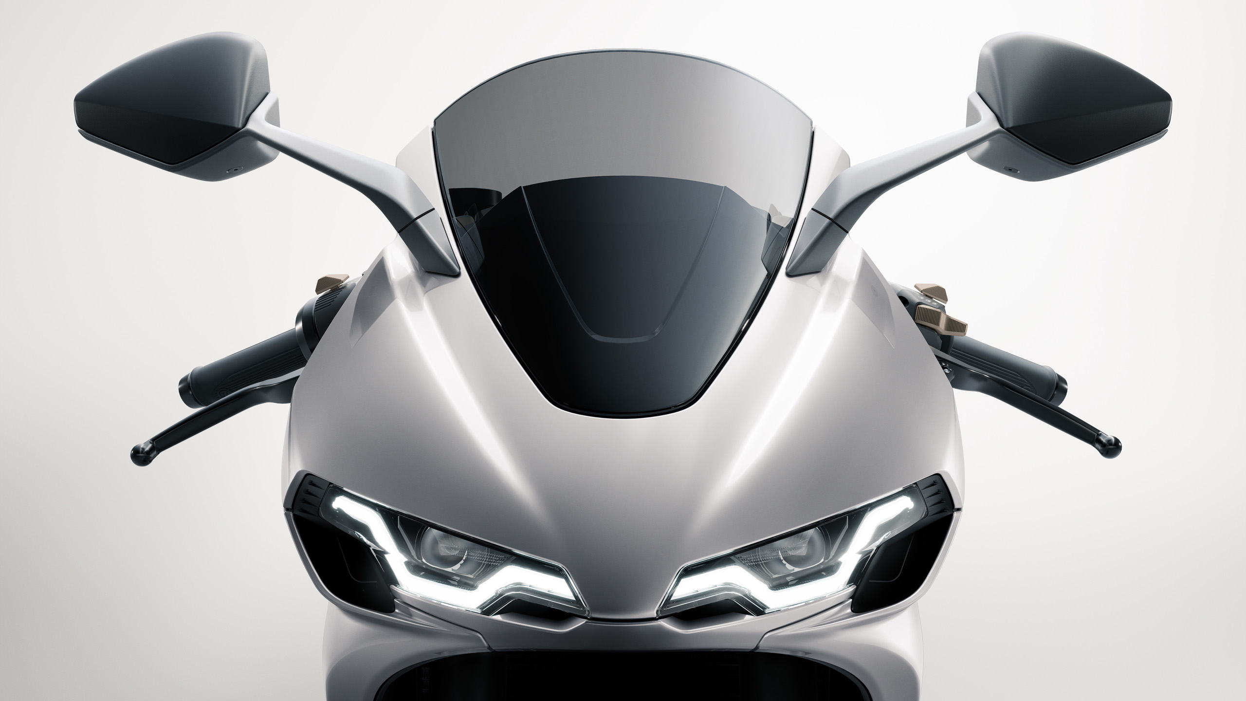 norton-manxr-cgi-headlight-detail-16×9 Head-on CGI close-up of the Norton ManxR's LED headlight and mirrors.