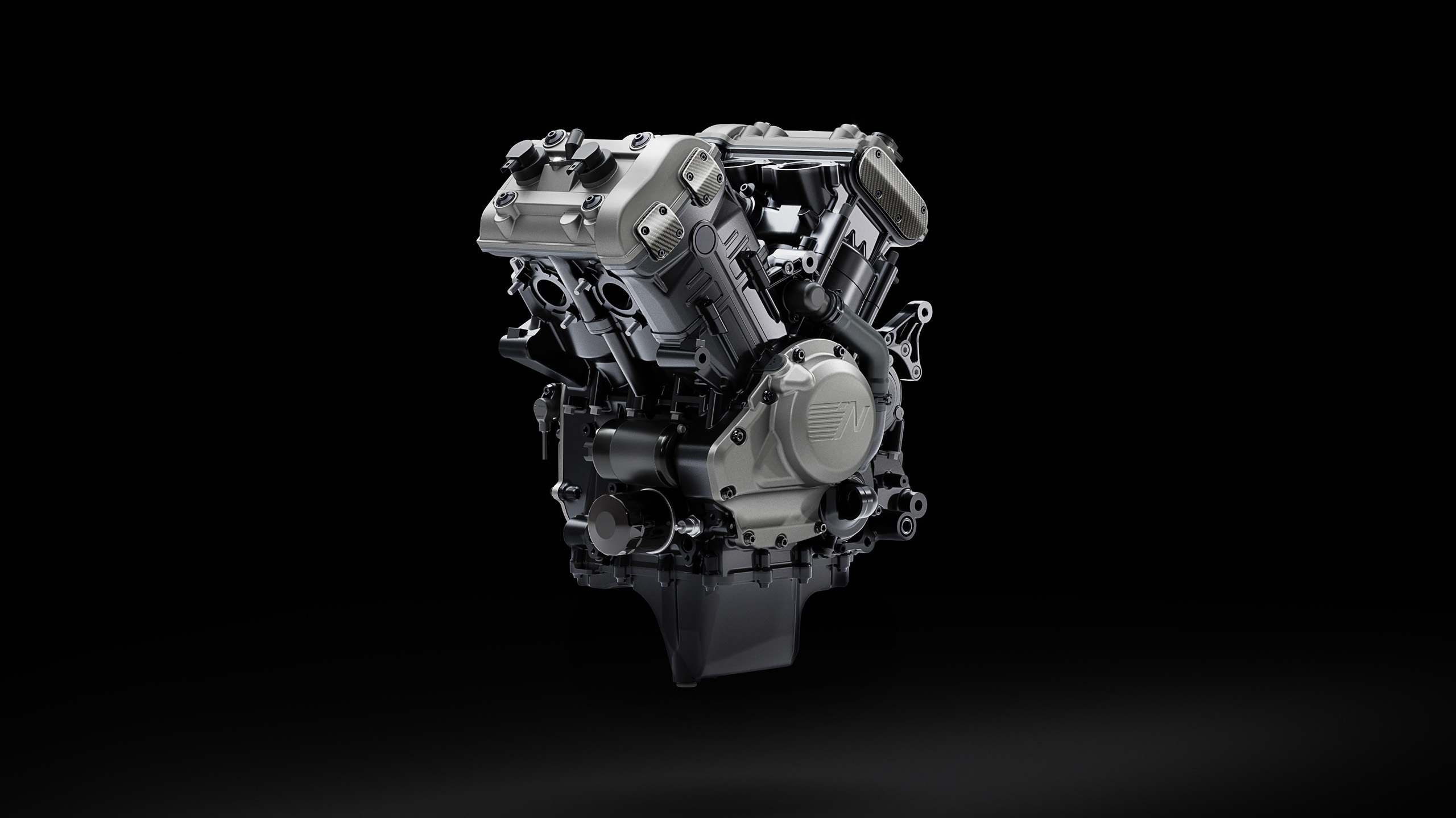 norton-manxr-engineering-art-engine CGI "Engineering Art" render of the Norton ManxR's V4 engine, isolated on black.